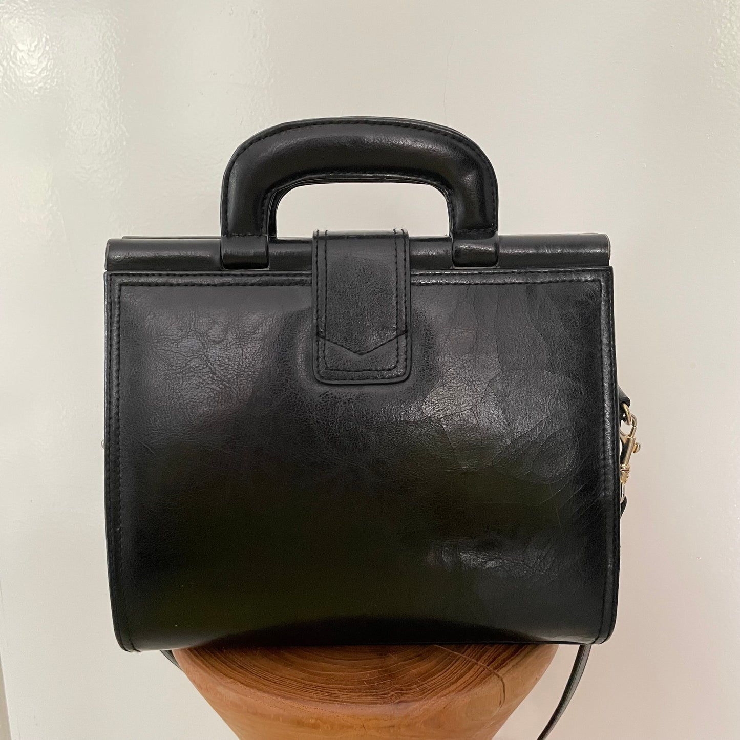 Vintage 1980s signed Lanza Black Leather bag with push lock button